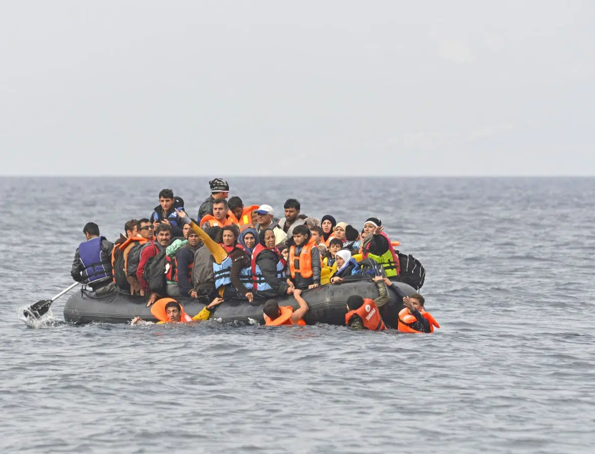Vluchtelingen op weg naar Lesbos, Griekenland | Fotografie: Anjo Kan